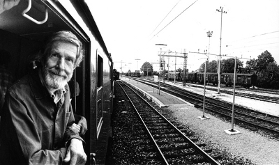 John Cage leaning out of the train